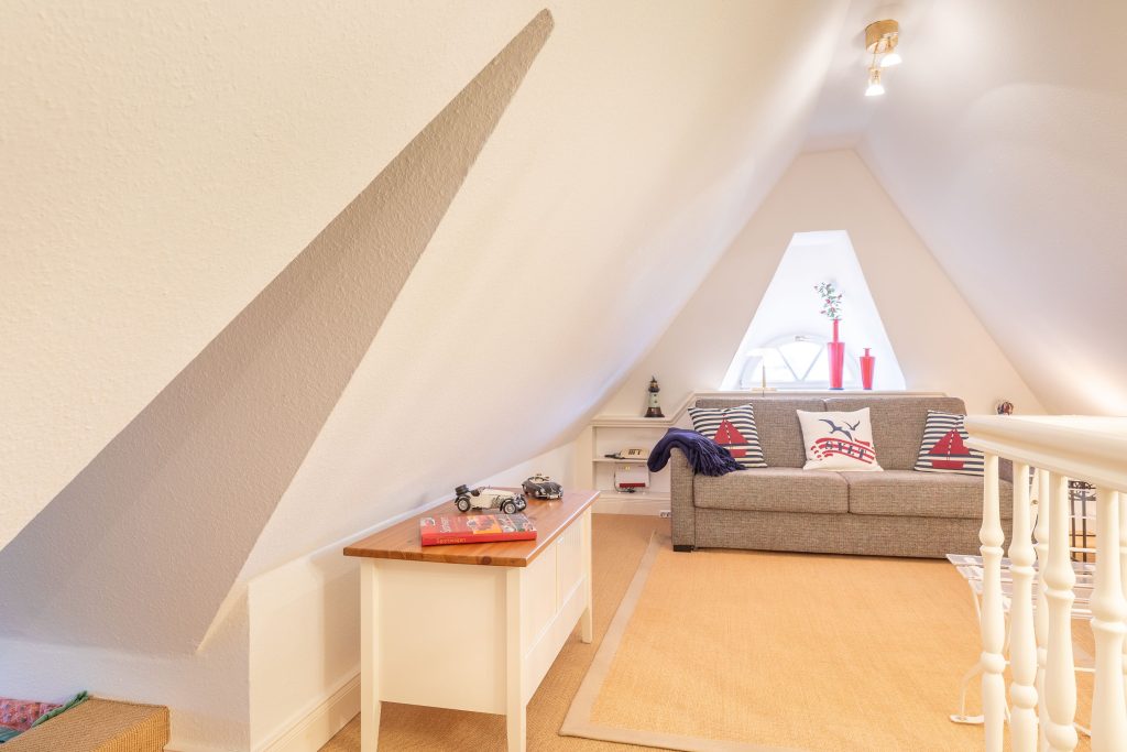 Wohnzimmer mit ersten Stock in Ferienwohnung Keitum